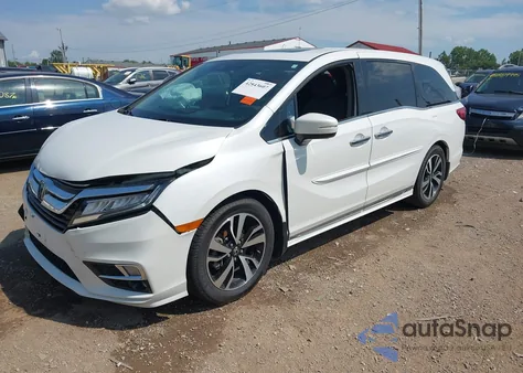 2020 Honda Odyssey Elite z USA, uszkodzony, nr VIN 5FNRL6H99LB058215